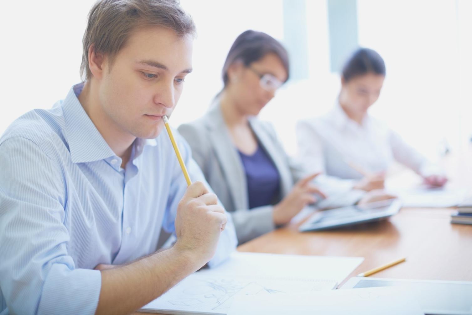 Financial analysis workspace showing charts and data visualization on modern displays